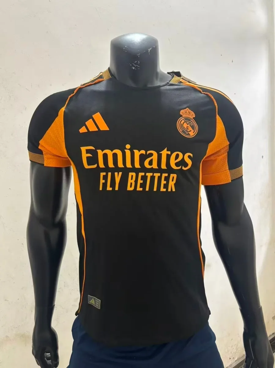 Maillot Real Madrid Noir & Orange 2025/2026